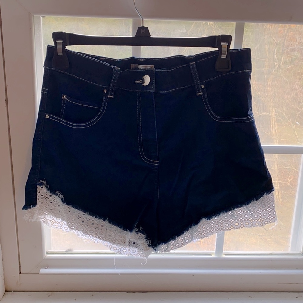High waisted Jean shorts with white detail near thighs